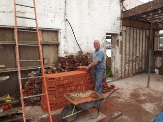 Now Jim has the bricks, repairs to the walls can now begin.